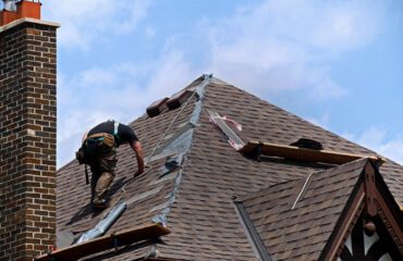 Man repairing roof